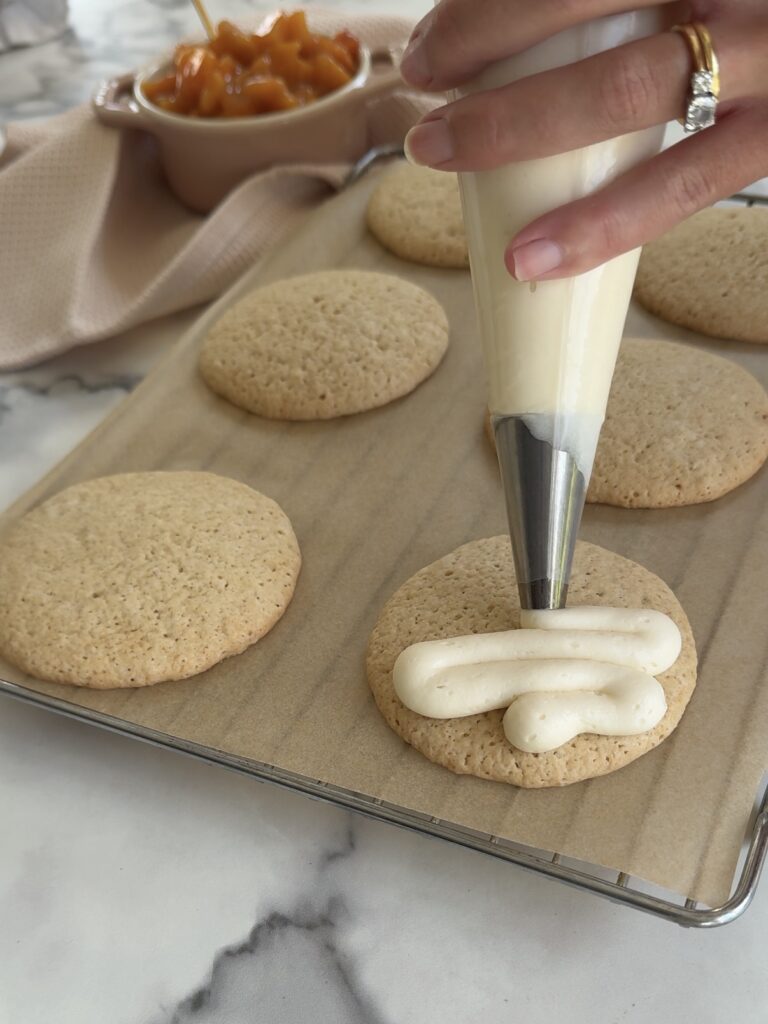 Frosting the cookies with a piping bag